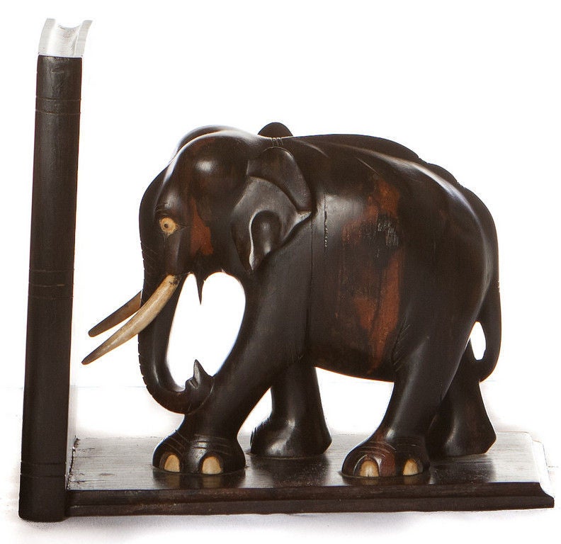 Pair of Early 20th Century Black Ebony Wood Elephant Bookends<br />
Ivory Tusks<br />
Inlay