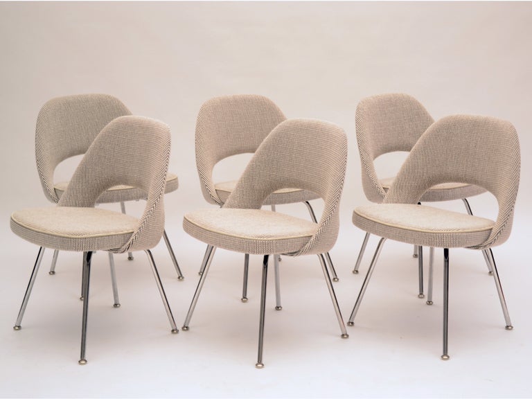Stainless Steel Set of 8 Saarinen chairs upholstered in Cato