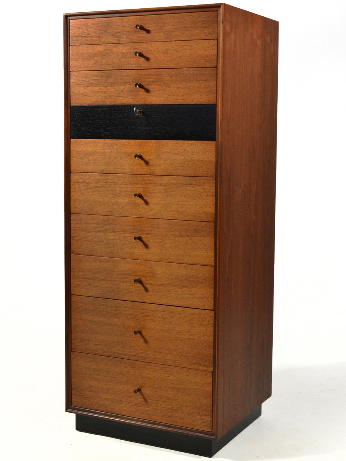 Designed by Stewart MacDougall and Kipp Stewart for Glenn of California, this stately and handsome ten drawer chest is also highly functional, perfect for the gentleman or lady. The scale of the piece allows it to fit nearly anywhere and the drawer