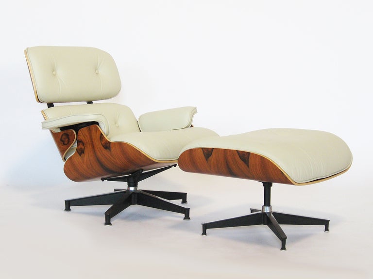 The iconic lounge chair an ottoman by Charles and Ray Eames, is a masterpiece of modern design. Combining industrial and luxury materials, the chair is as comfortable as it is attractive.

This example is recent Herman Miller production and