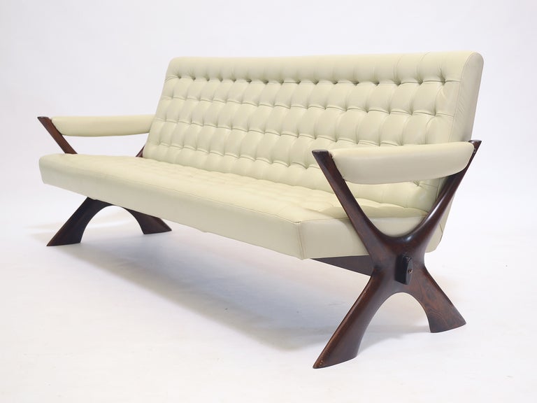 Illum Wikkelso's work is quite distinctive and stands apart from most of his contemporaries. This sofa (and the matching pair of lounge chairs, also available) are a perfect example. It is stunning from any angle. His unique sculptural sensibility