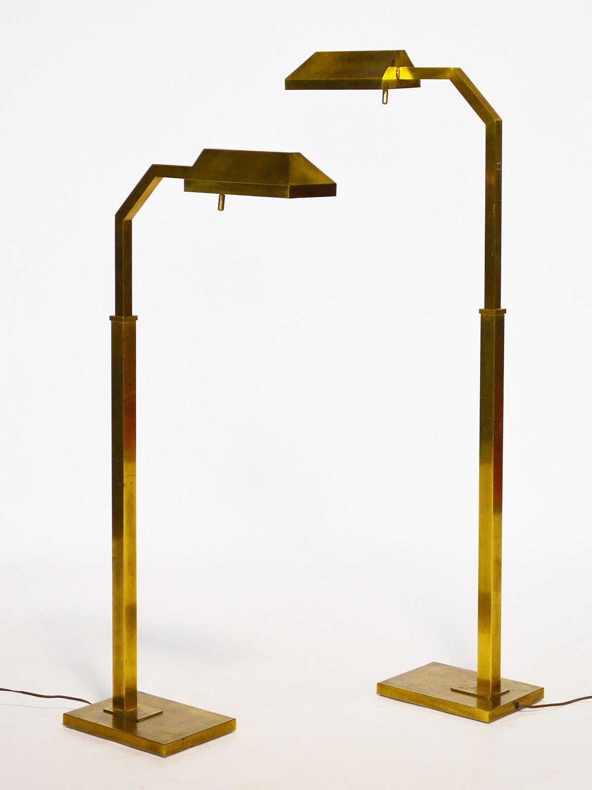 Pair of brass Chapman adjustable reading lamps