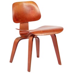 Eames Red Aniline DCW by Herman Miller