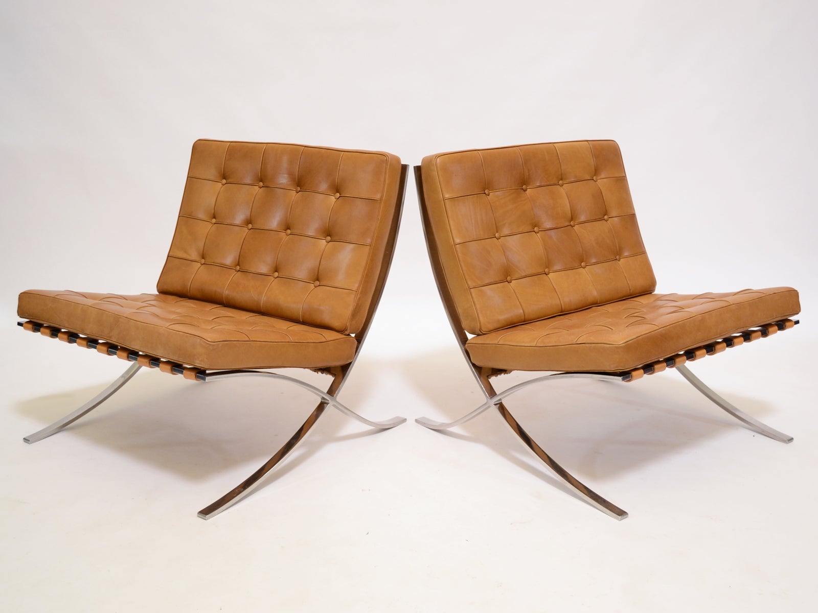 Pair of Ludwig Mies van der Rohe Barcelona chairs by Knoll
