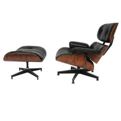 Eames lounge chair by Herman Miller with highly figured rosewood