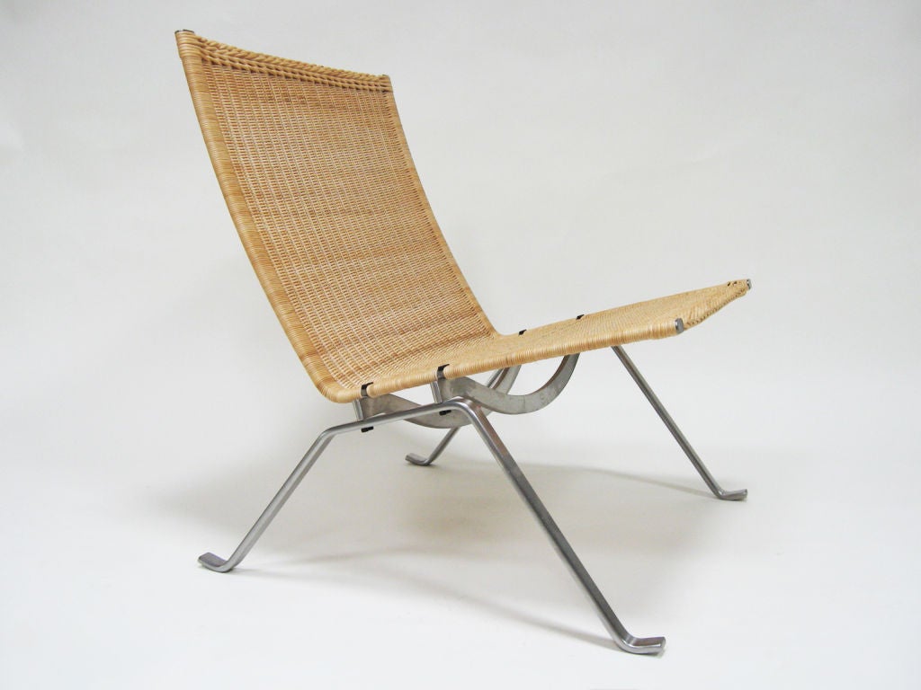 Steel PK22 in wicker by Poul Kjaerholm