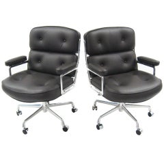 Pair of leather Eames Time-Life chairs by Herman Miller