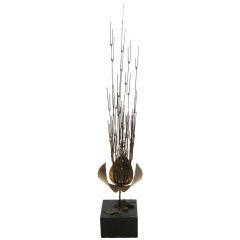 Early organic sculpture in brass by  C. Jere