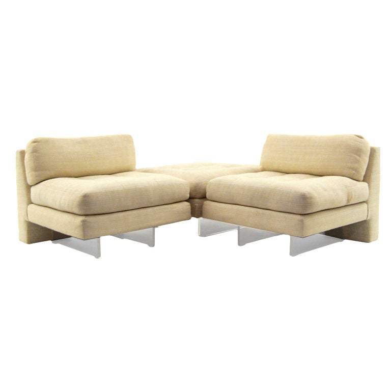 Omnibus slipper chairs and bench by Vladimir Kagan
