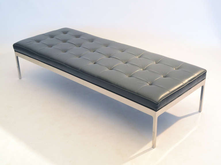 This beautiful, understated design is classic Zographos. The stainless steel base has radius corners and supports a tufted dark cool gray leather cushion. The proportions of this form make it perfect for use as either a bench or a day bed.