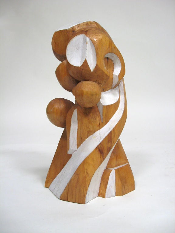 Dating from the late 1950s, this dynamic sculpture by New England artist Arthur Rossfield is a visual delight. Equally interesting from any angle, partially painted, the wood form undulates, twists and bulges in a vividly organic manner. It is