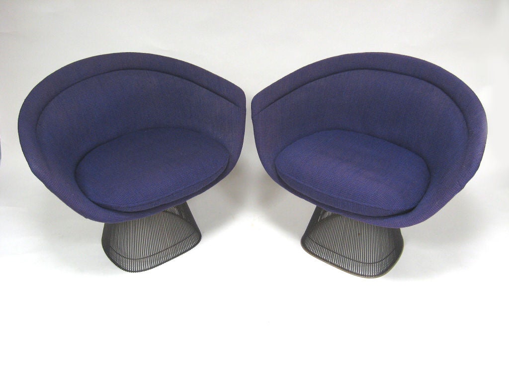 With his 1962 collection for Knoll, Warren Platner introduced an elegance and gracefulness that did not shy from touches of decorative appeal which previously would have ben eschewed by staunch modernists. These lounge chairs are a perfect example.