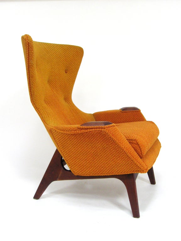 American designer Adrian Pearsall was clearly inspired by Scandinavian design, but his exuberant style also references Vladimir Kagan's sculptural work. This wing-back chair, model 2231-C, is a great example. The modern take on a traditional form