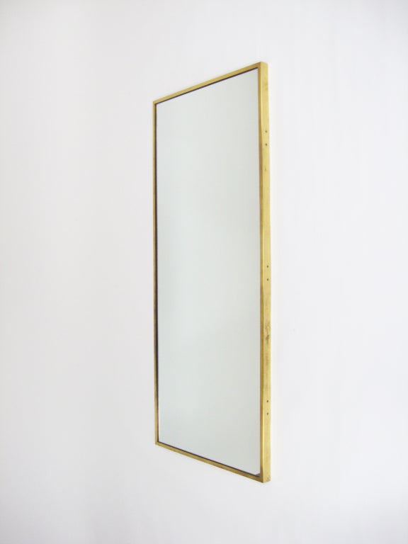 Mid-20th Century Brass framed mirror by Paul McCobb for Calvin