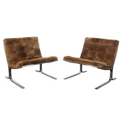 Pair of Nicos Zographos lounge chairs