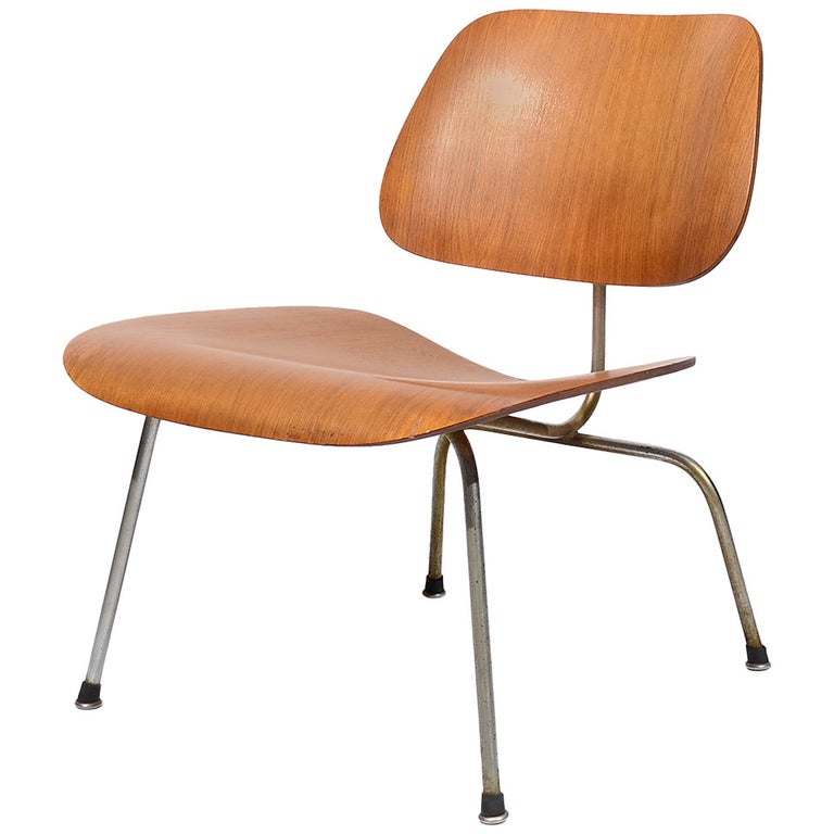 Charles and Ray Eames Walnut LCM Lounge Chair by Herman For Sale at 1stDibs | eames lcm, eames chair lcm, herman miller molded plywood chair