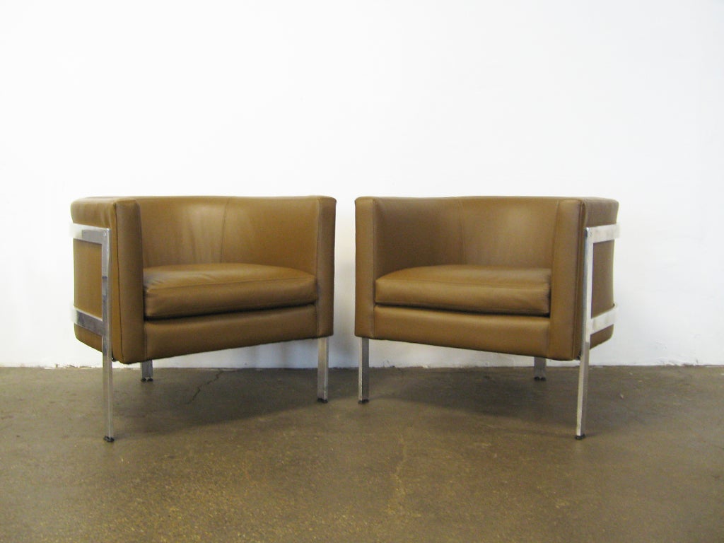 Pair of three-legged barrel back lounge chairs by Erwin-Lambeth 2
