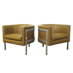 Pair of three-legged barrel back lounge chairs by Erwin-Lambeth