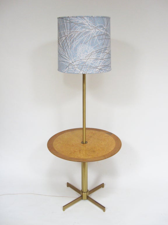 This table lamp by Edward Wormley is an exceedingly rare variation on the model 5410 by Dunbar. The model 5410 was produced with a couple base variations, but this example has several noteworthy differences. The first is scale. At 63