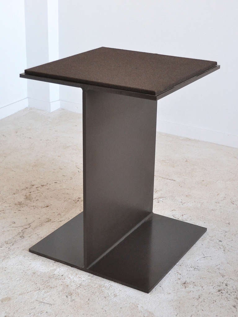 Designed by important Chicago interior architects Powell/ Kleinschmidt, this pedestal was fabricated for an custom interior and is made in the form of a I-beam. This is a design which they have executed in several commissions over the years in a