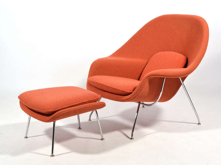 Saarinen's iconic and incredibly comfortable womb chair and ottoman upholstered in persimmon 