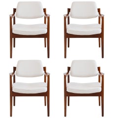 Set of Four Jens Risom Walnut Armchairs