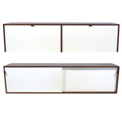 Pair of Florence Knoll Walnut Wall Mounted Credenzas or Cabinets