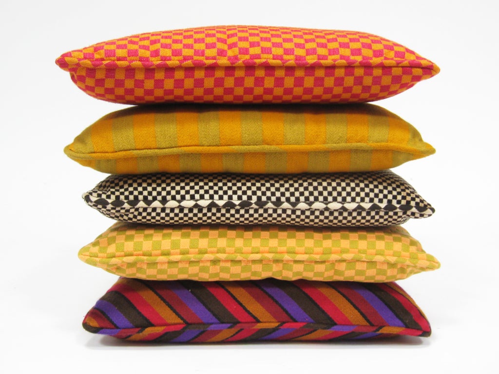 This wonderful assortment of vintage Alexander Girard pillows include examples of some of his most famous textile designs.