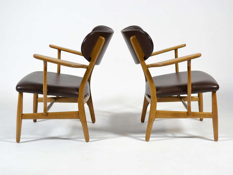 Scandinavian Modern Rare Pair of Hans Wegner CH22 Easy Chairs by Carl Hansen