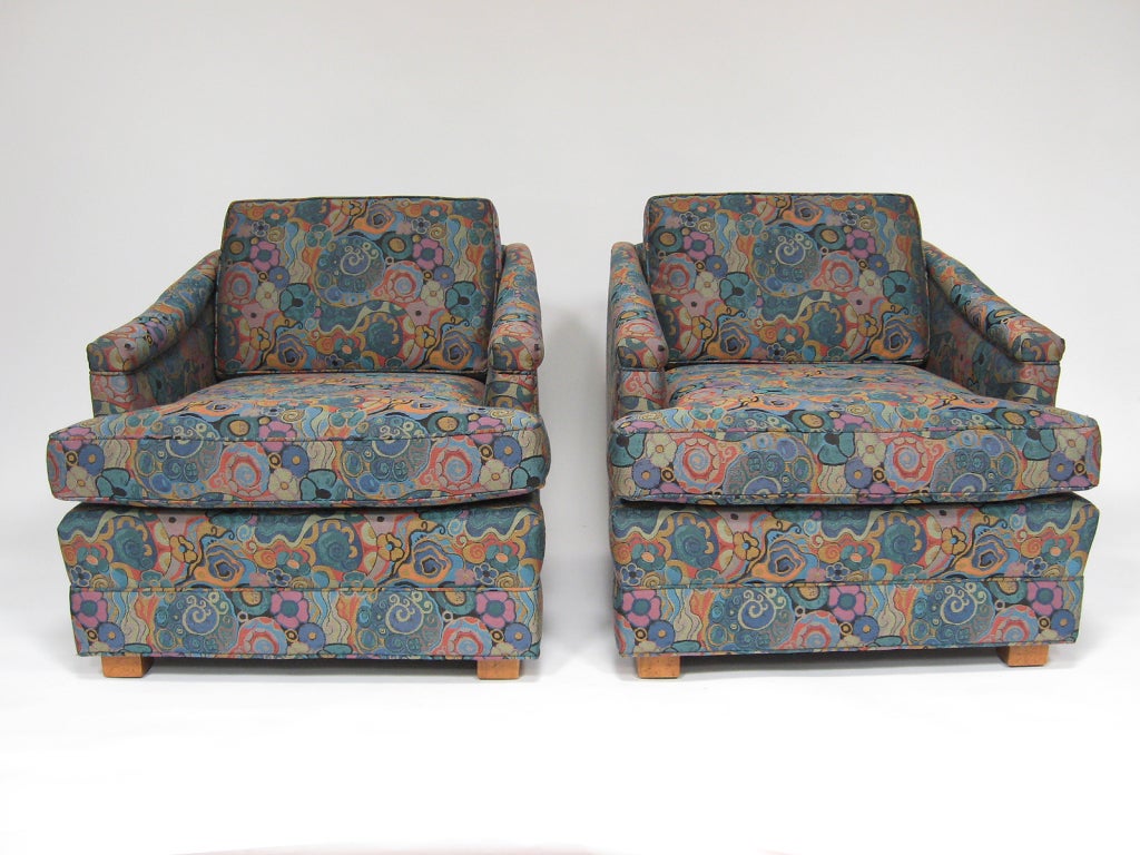 These lightly scaled lounge chairs by Edward Wormley for Drexel are nicely proportioned and detailed with a subtle silhouette. The Jack Lenor-Larsen upholstery adds a playful quality with its abstract psychedelic floral print.