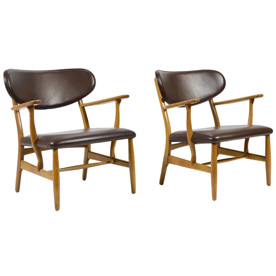 Rare Pair of Hans Wegner CH22 Easy Chairs by Carl Hansen