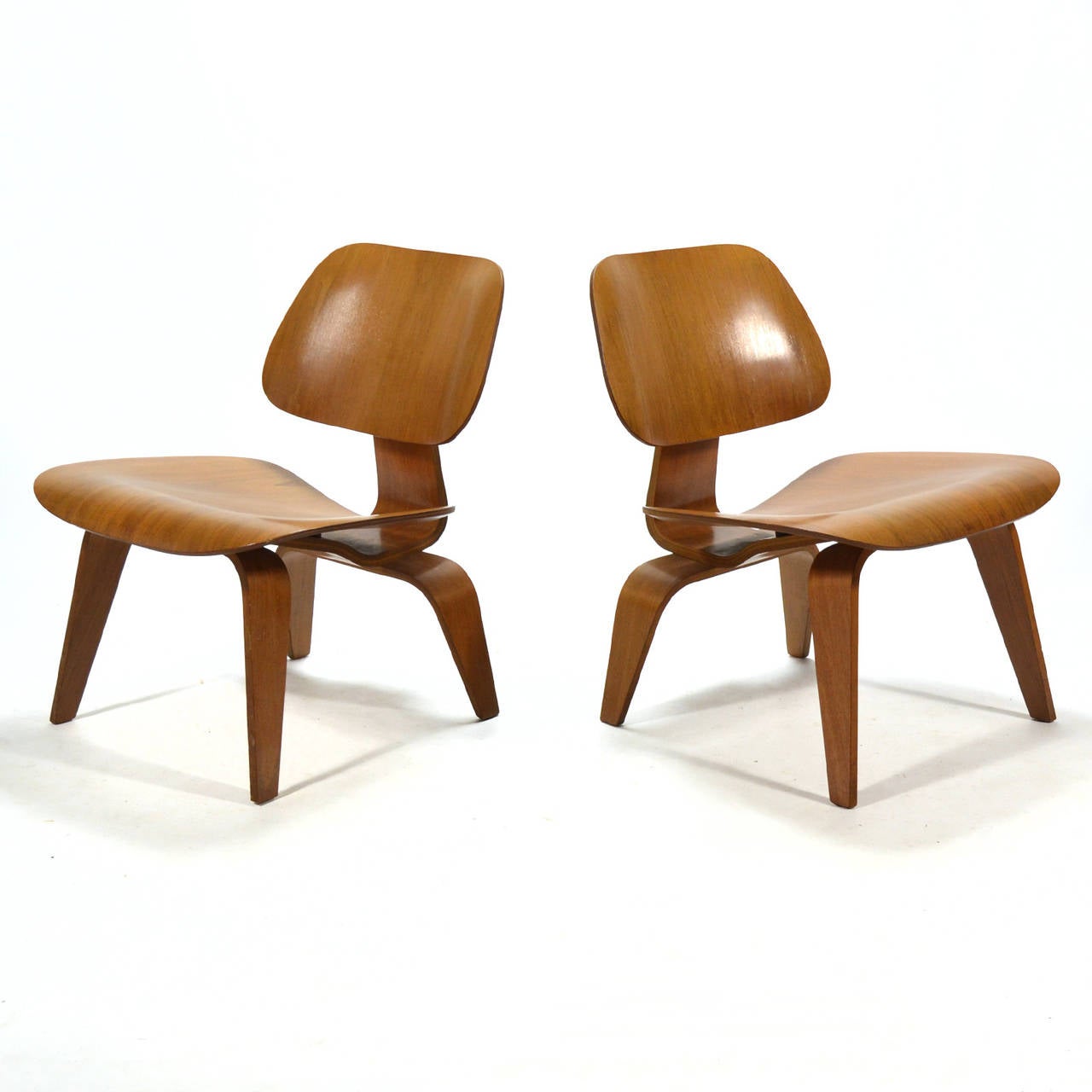 Eames Rare Matched Pair of Walnut LCW Lounge Chairs at 1stDibs | eames lcw walnut, eames lcw