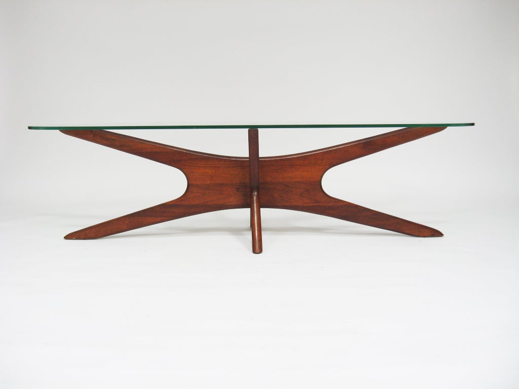 Adrian Pearsall is responsible for a broad body of work over his long career. His designs for Craft Associates have begun to attract great interest in recent years. This coffee table design shows the influence of Vladimir Kagan on Persall, with
