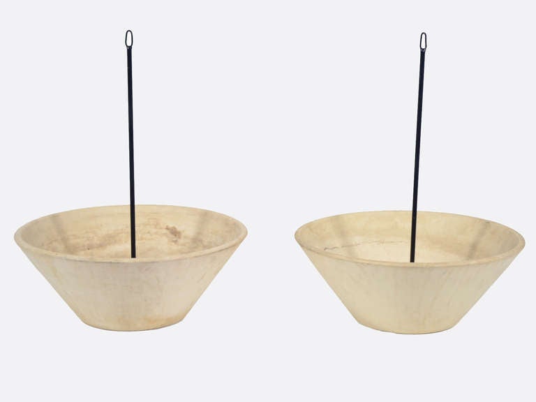 This fantastic pair of LaGardo Tackett's iconic conical planters are given even greater versatility with the addition of the steel hanging brackets. They can be used on the ground without the hangers, or suspended from the ceiling or eves.