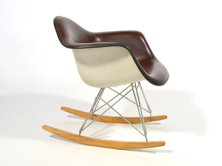 If an employee of Herman Miller were to have a child, they would be given an Eames RAR to rock the newborn. It would be marked with a small brass placard commemorating the name and birthdate of the child. This rare example is one of those rocking