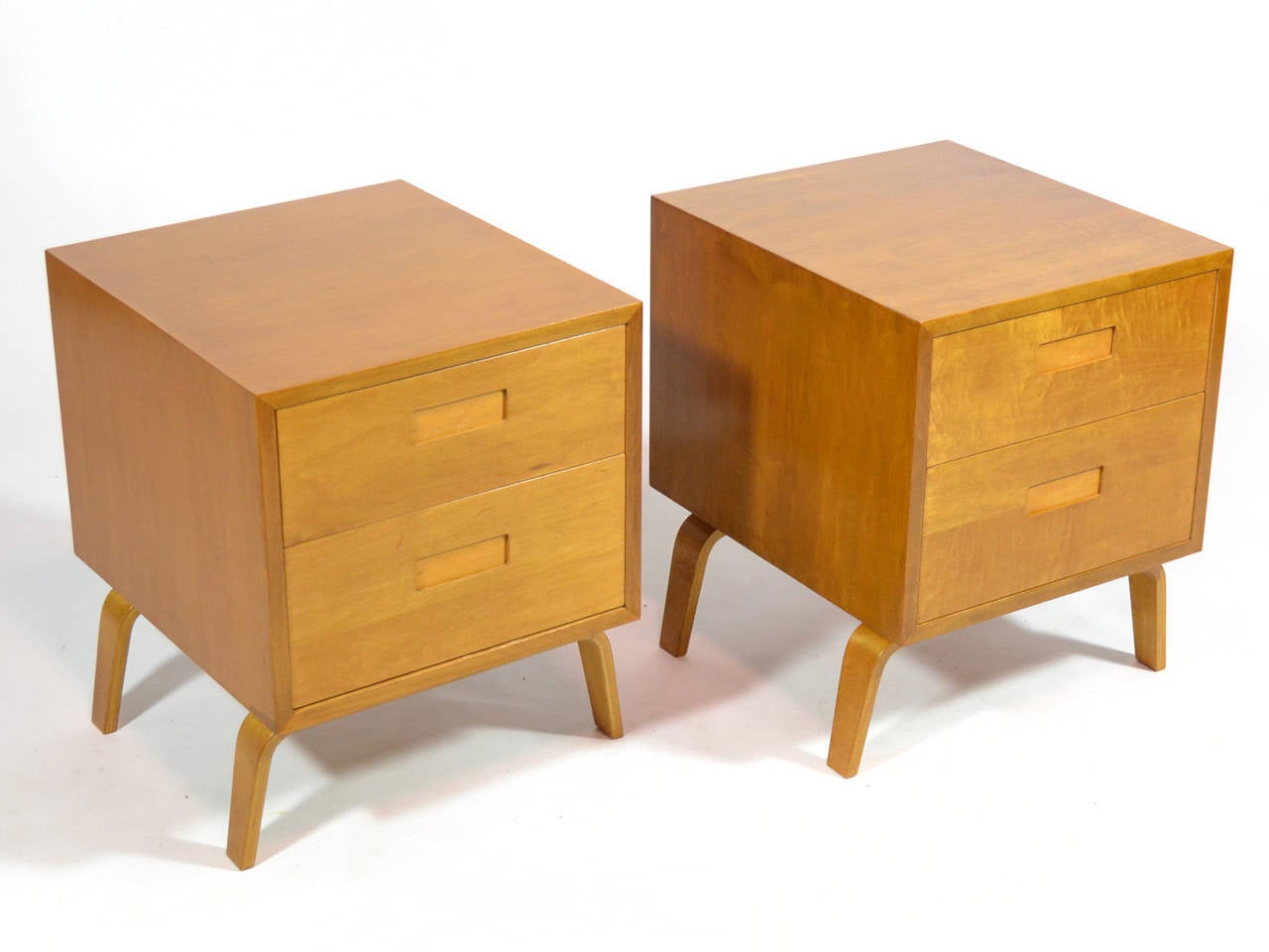 Designed by Clifford Pascoe who collaborated with Finnish master Alvar Aalto (even opening Artek-Pascoe in NYC) these tables can be used as bedside tables or end tables. They each have two drawers with inset spring-loaded pulls and are supported by
