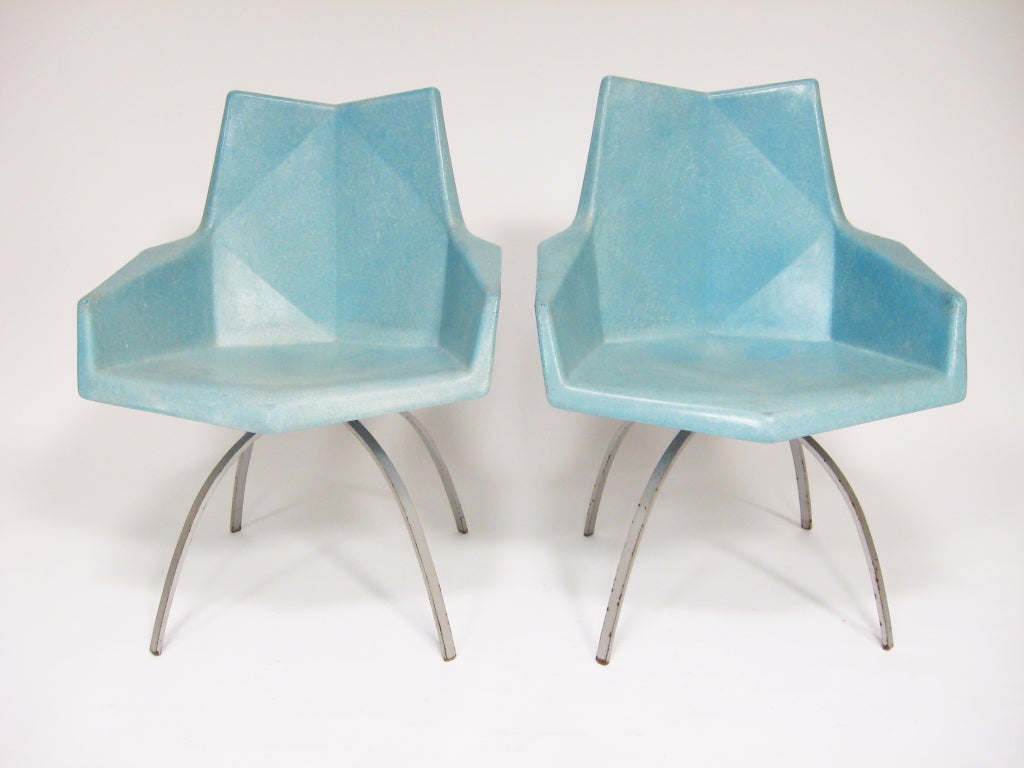 McCobb's fiberglass chairs features angular lines that earned them the nickname 