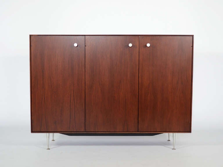 This rare Nelson model #5831 rosewood thin edge piece is described in the 1959 Herman Miller catalogue as the 