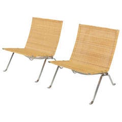 Pair of Poul Kjaerholm PK22 lounge chairs in wicker
