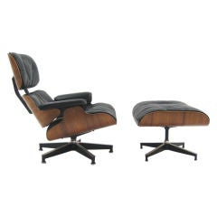 Early Eames rosewood & down lounge & ottoman by Herman Miller
