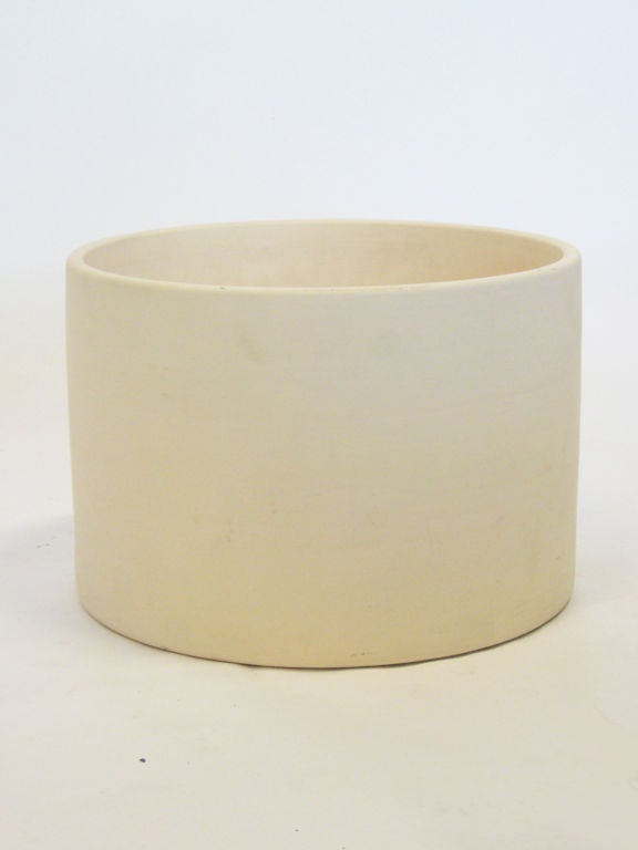 A fine example of Architectural Pottery’s pleasingly simple geometric forms, this planter was always used with an insert so it was never exposed to the minerals in potting soil. Therefore it remains in pristine original condition. The bisque finish