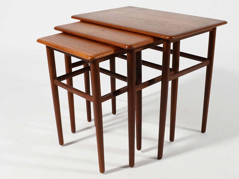 This set of three nesting tables in teak is both lovely and practical. They range in size:
Largest 20