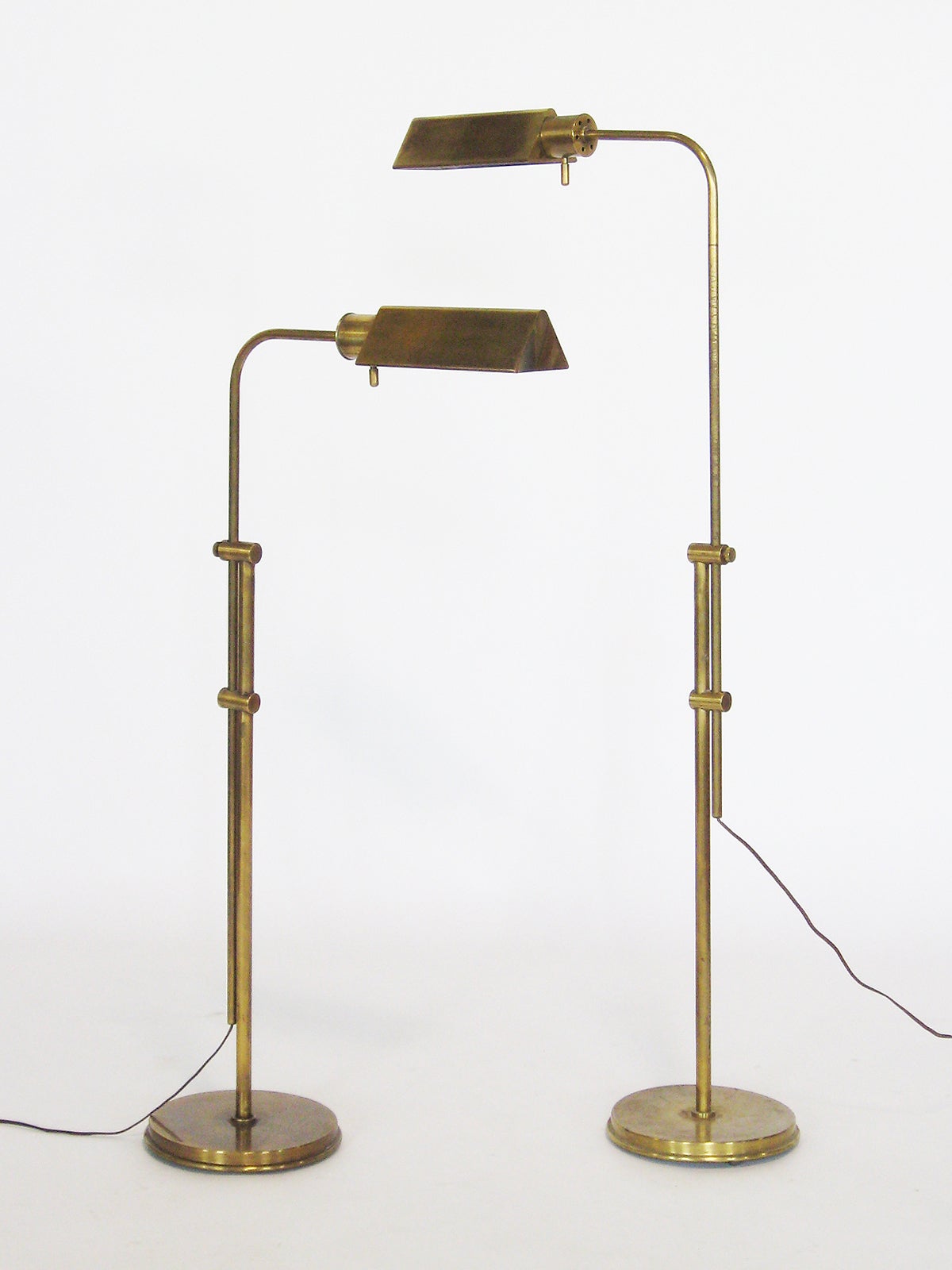Pair of Frederick Cooper adjustable floor lamps