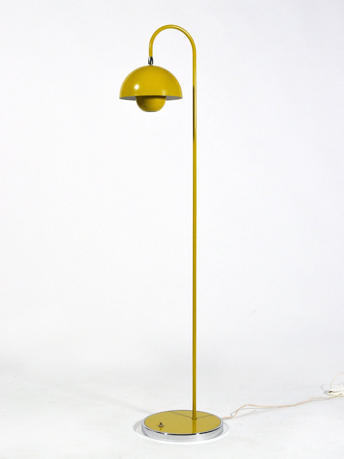 Everything he designed was subject to Panton's playful and innovative aesthetic. Chairs, tables, textiles, and of course lighting. This floor lamp is from a series of 