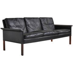 Retro Leather and Rosewood Sofa by Hans Olsen