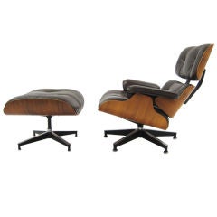 Eames rosewood & brown leather lounge & ottoman by Herman Miller