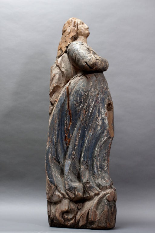Exceptional carved wooden figure with blue period dress