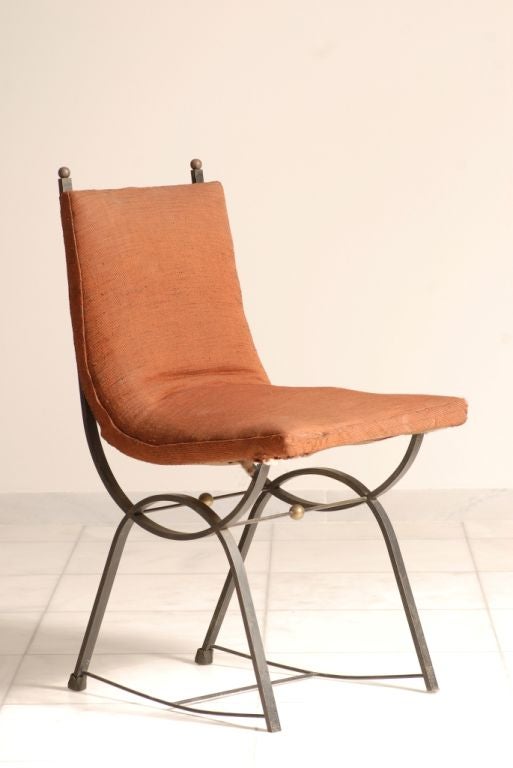 Eight Iron chairs
