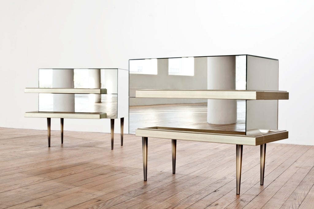 Metallic and gilded frames as drawer pulls, mirrored case, tapered brass legs, two drawers. Priced separately.
Please note these are not currently in stock but are available by special order.  Allow 6-8 weeks for production.