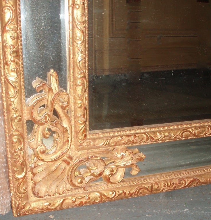 Carved Regence Style Giltwood Mirror For Sale